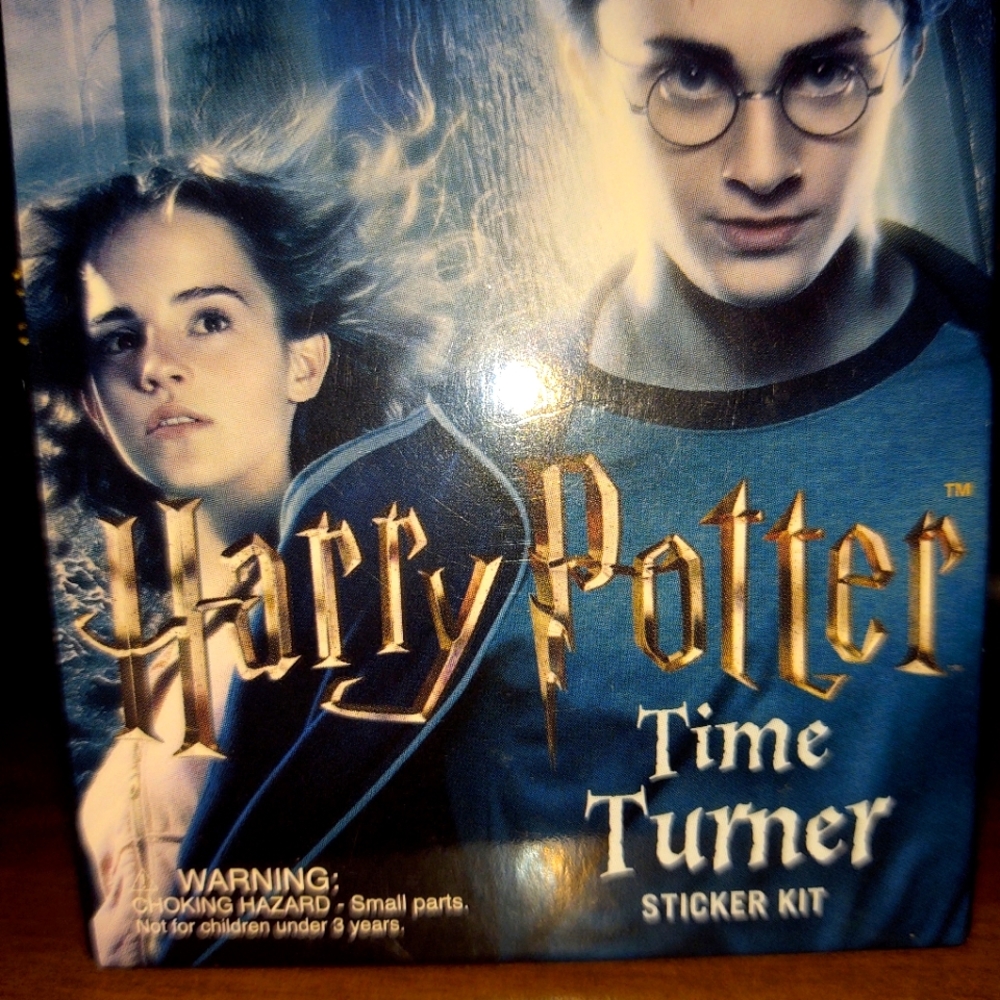 Harry Potter time turner! Comes with the time turner, and a sticker book!